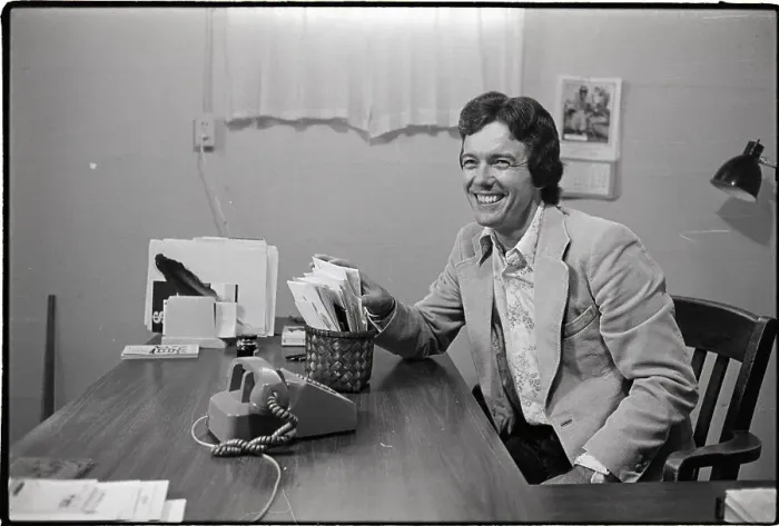 Framed Print : Rennie Davis Working at Desk in Office Framed Print : Rennie Davis Working at Desk in Office