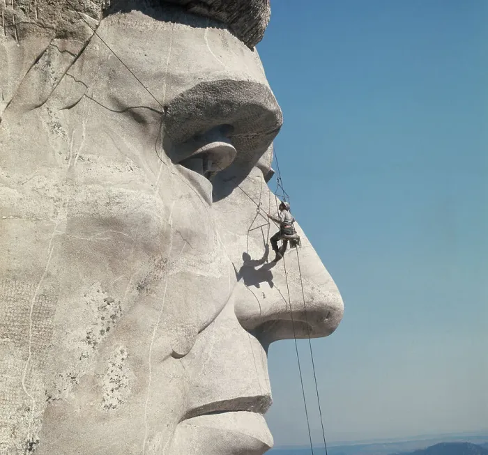 Framed Print : Repairman on Face of Abraham Lincoln from Mount Rushmore Memorial by Gutzon Borglum Framed Print : Repairman on Face of Abraham Lincoln from Mount Rushmore Memorial by Gutzon Borglum