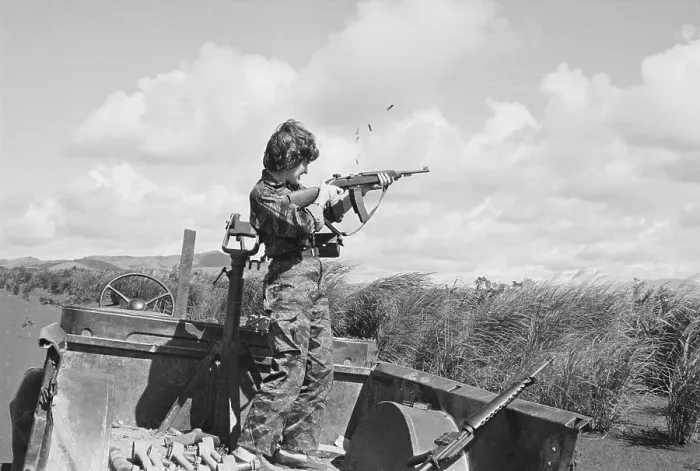 Framed Print : Reporter Firing M-16 Rifle During Vietnam War Framed Print : Reporter Firing M-16 Rifle During Vietnam War