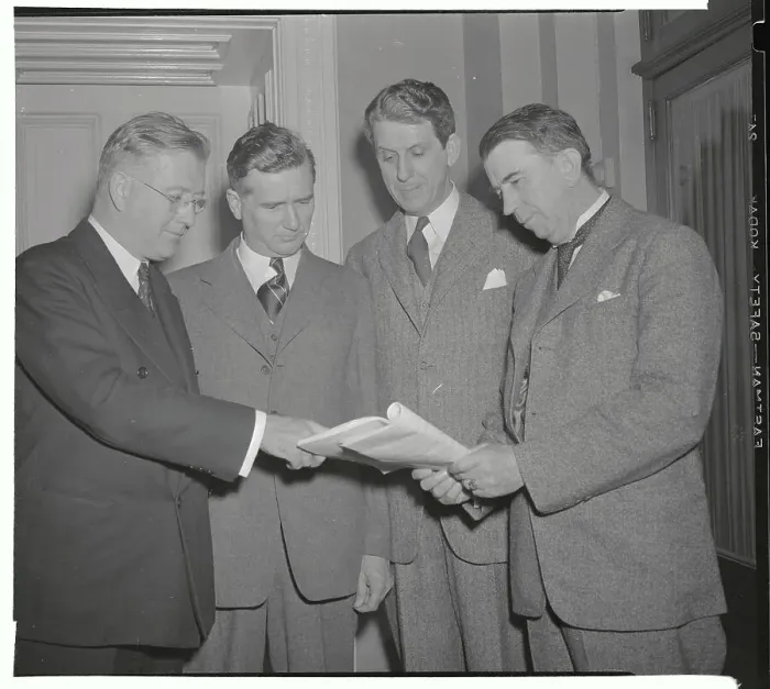 Framed Print : Representatives Looking at Magazine Framed Print : Representatives Looking at Magazine