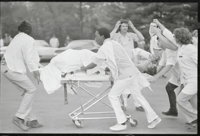 Framed Print : Rescue Workers Rushing Injured Victim Framed Print : Rescue Workers Rushing Injured Victim