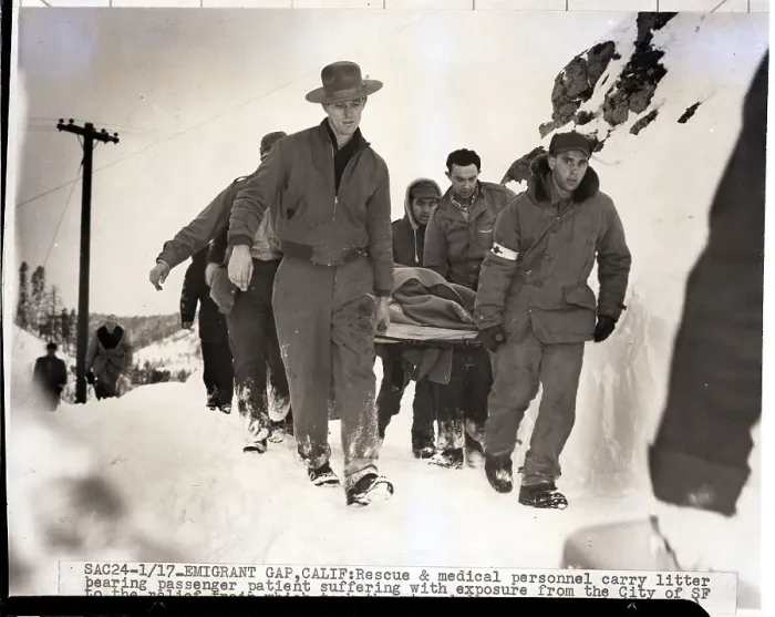 Framed Print : Rescuers Carry Stretcher Out of Train