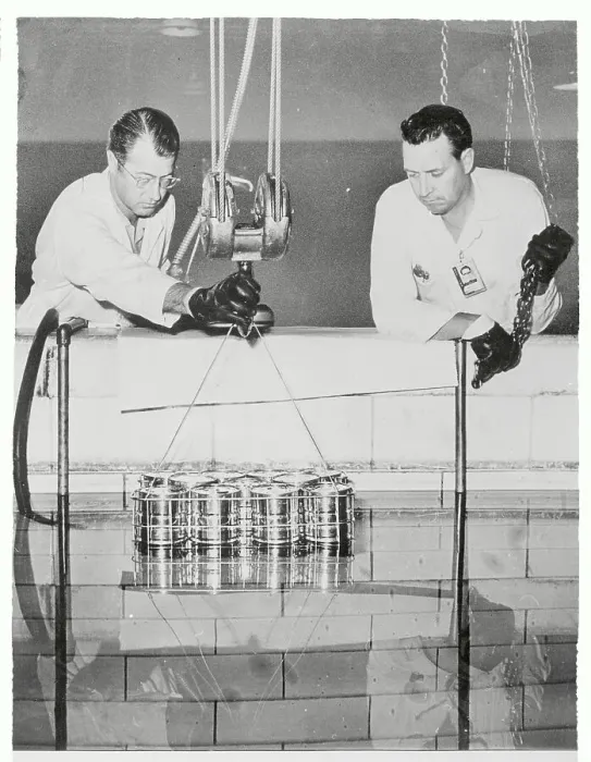 Framed Print : Researchers Lowering Cans Into Reactor Framed Print : Researchers Lowering Cans Into Reactor