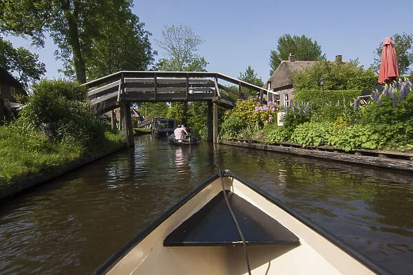 Residential Houses, Bridge and Boats In Giethoorn Village