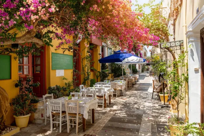 Framed Print : Restaurant in an alley under a bougainvillea tree Framed Print : Restaurant in an alley under a bougainvillea tree