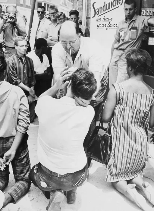 Framed Print : Restaurant Owner Smashes Egg In Protester's Face Framed Print : Restaurant Owner Smashes Egg In Protester's Face