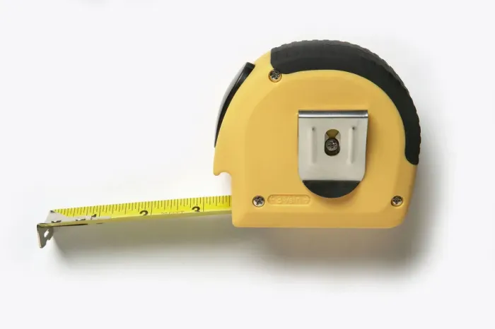 Framed Print : Retractable tape measure Framed Print : Retractable tape measure