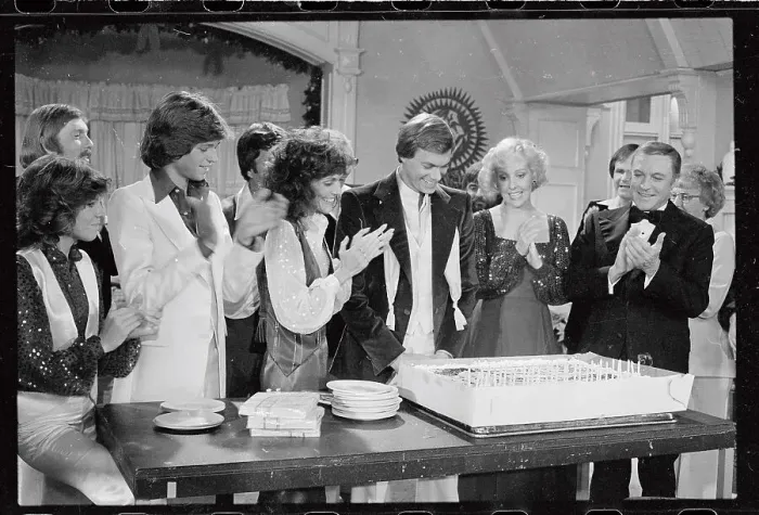 Framed Print : Richard Carpenter Receiving Birthday Cake with Famous Friends Framed Print : Richard Carpenter Receiving Birthday Cake with Famous Friends