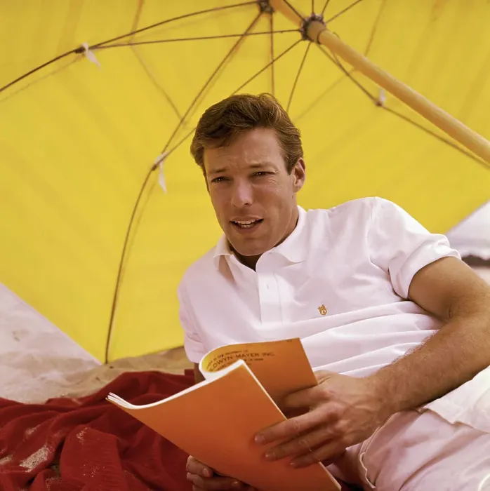 Framed Print : Richard Chamberlain Shielded by Yellow Umbrella Framed Print : Richard Chamberlain Shielded by Yellow Umbrella
