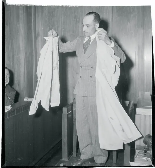 Framed Print : Richard E. Daniel Displaying Bloody Clothing at Senate Hearing