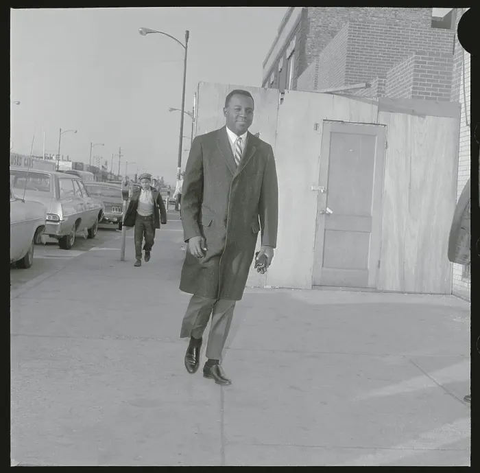 Framed Print : Richard Hatcher Strolling Down a Sidewalk