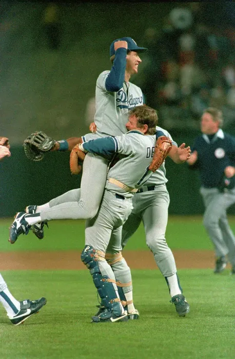 Framed Print : Rick Dempsey Hugging Orel Hershiser