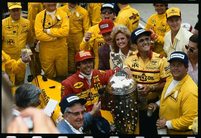Framed Print : Rick Mears Celebrating with Trophy Framed Print : Rick Mears Celebrating with Trophy