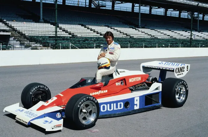 Framed Print : Rick Mears Sitting on Race Car