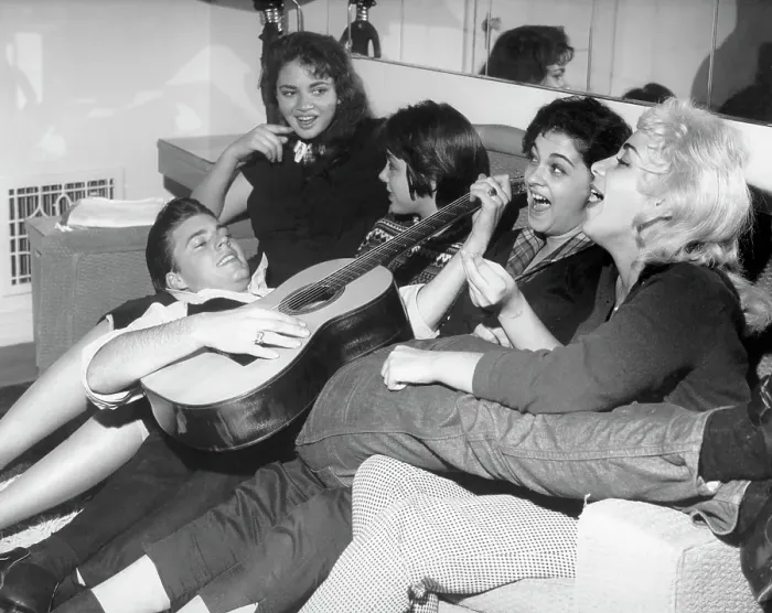 Framed Print : Ricky Nelson On Fans Laps