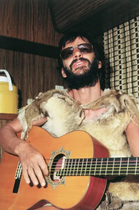 Framed Print : Ringo Starr in Caveman Costume with Guitar Framed Print : Ringo Starr in Caveman Costume with Guitar