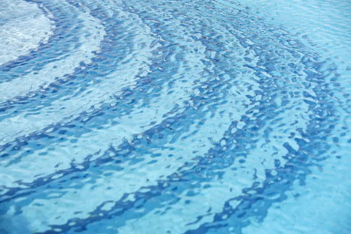 Framed Print : Rippled water surface in a swimming pool, detail, blue with steps below the surface Framed Print : Rippled water surface in a swimming pool, detail, blue with steps below the surface