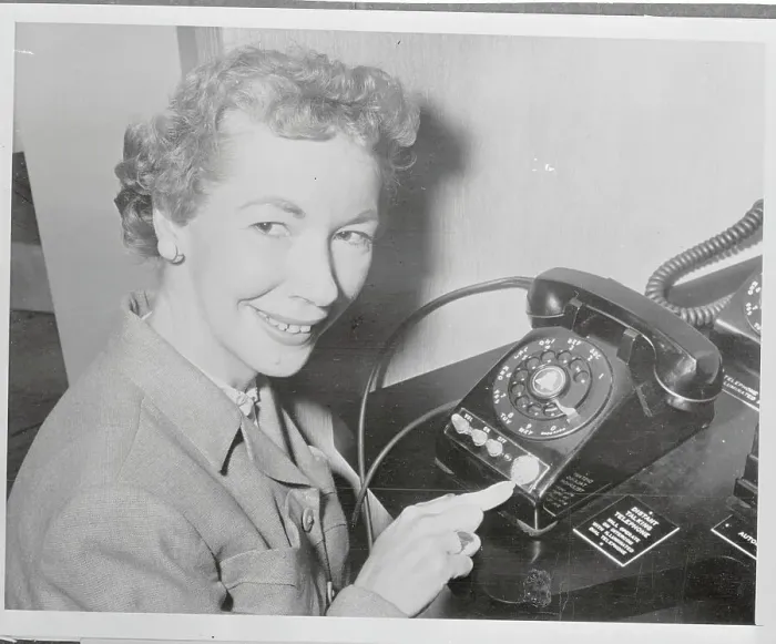Framed Print : Rita Ackerson Demonstrating Use of a New Telephone