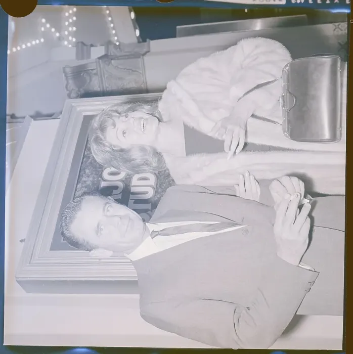 Framed Print : Rita Hayworth Holding Glenn Ford's Arm Framed Print : Rita Hayworth Holding Glenn Ford's Arm