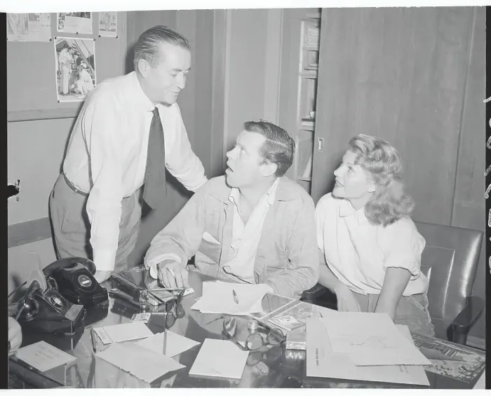 Framed Print : Rita Hayworth and Husband Conversing with Attorney Framed Print : Rita Hayworth and Husband Conversing with Attorney