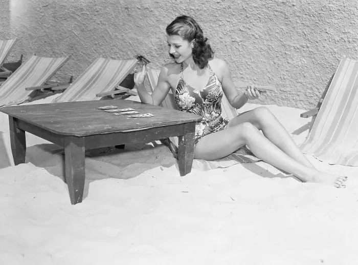 Framed Print : Rita Hayworth Playing Cards at a Beach Framed Print : Rita Hayworth Playing Cards at a Beach