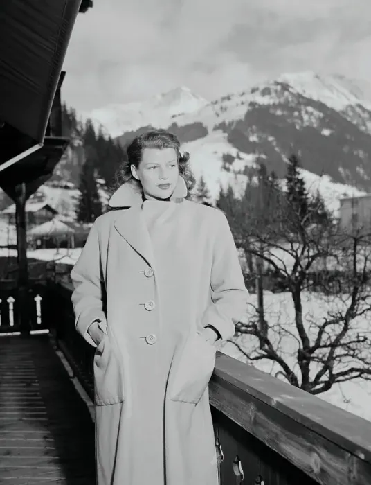 Framed Print : Rita Hayworth Posing in Overcoat
