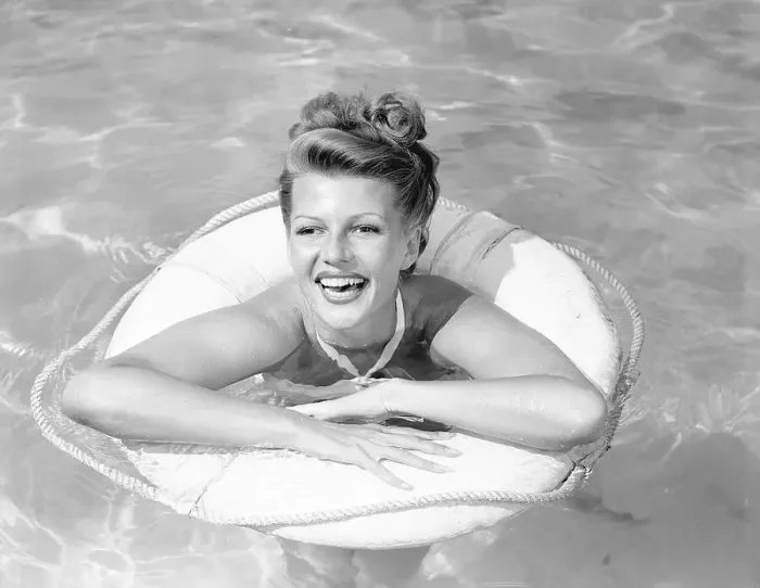 Framed Print : Rita Hayworth Posing in Swimming Pool Framed Print : Rita Hayworth Posing in Swimming Pool
