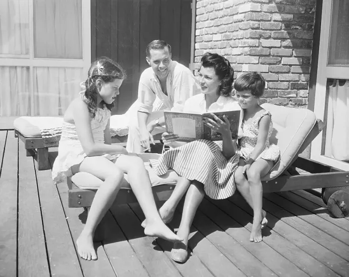 Framed Print : Rita Hayworth Reading Book to Her Daughters Framed Print : Rita Hayworth Reading Book to Her Daughters