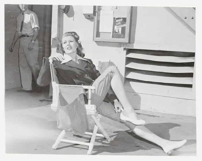 Framed Print : Rita Hayworth Resting on Film Set