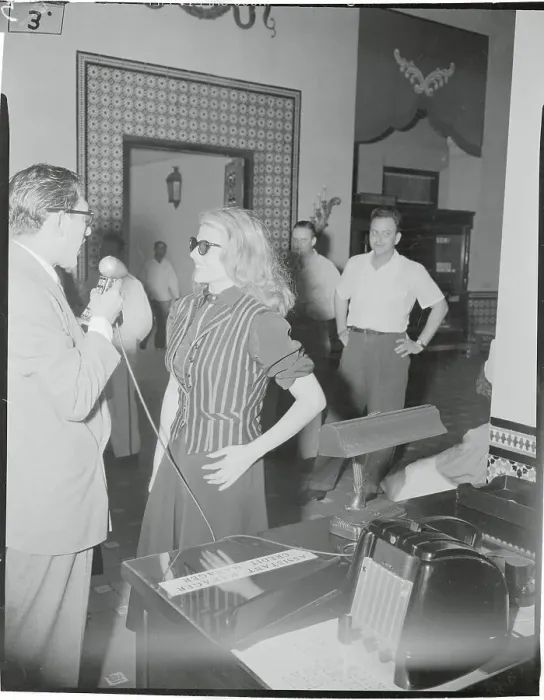 Framed Print : Rita Hayworth Speaking to Reporter Framed Print : Rita Hayworth Speaking to Reporter