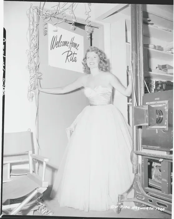 Framed Print : Rita Hayworth Standing In Doorway Framed Print : Rita Hayworth Standing In Doorway
