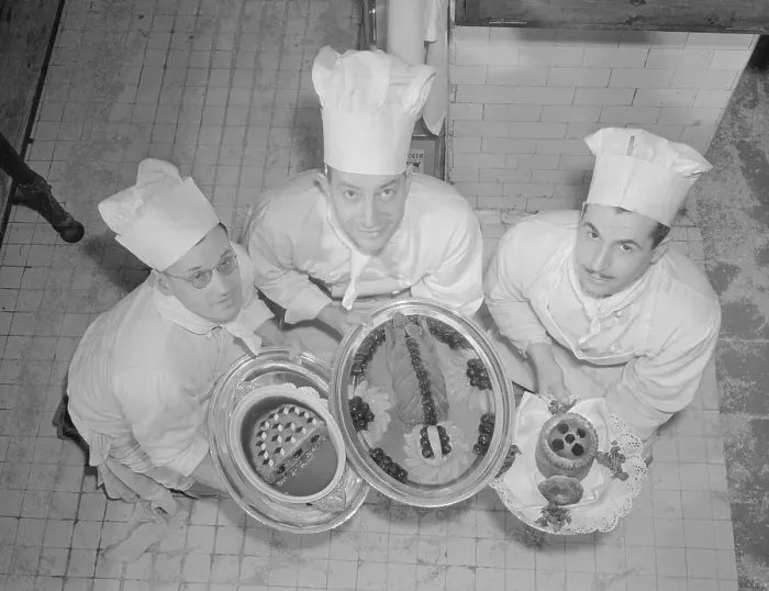 Framed Print : Ritz-Carlton Chefs Holding Trays of French Food Framed Print : Ritz-Carlton Chefs Holding Trays of French Food