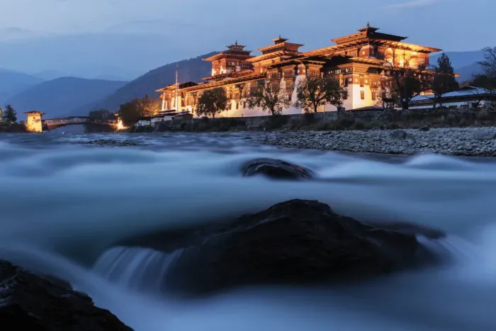 Framed Print : River and illuminated buildings, Punakha, Punakha District, Bhutan