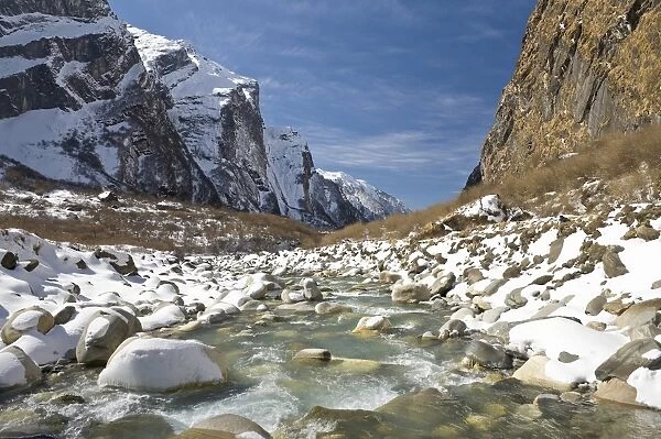 River in snowy mountain landscape