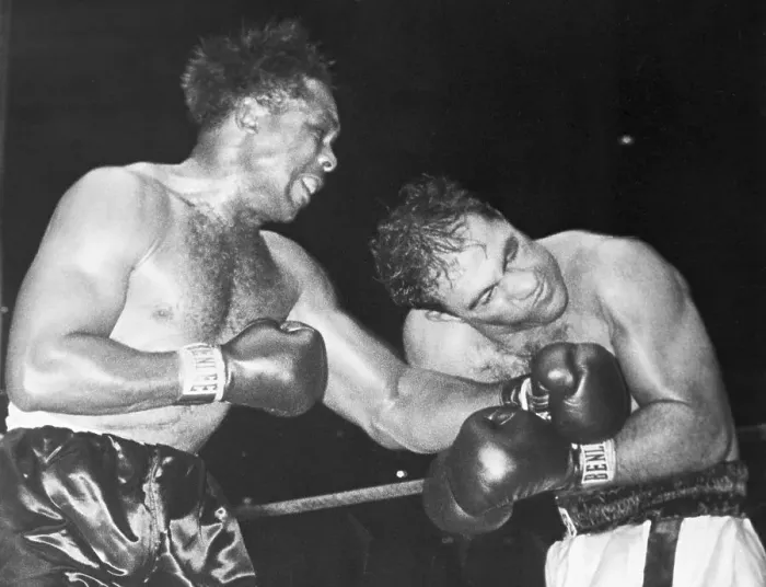 Framed Print : R.Marciano Bent After Punch / Archie Moore Framed Print : R.Marciano Bent After Punch / Archie Moore