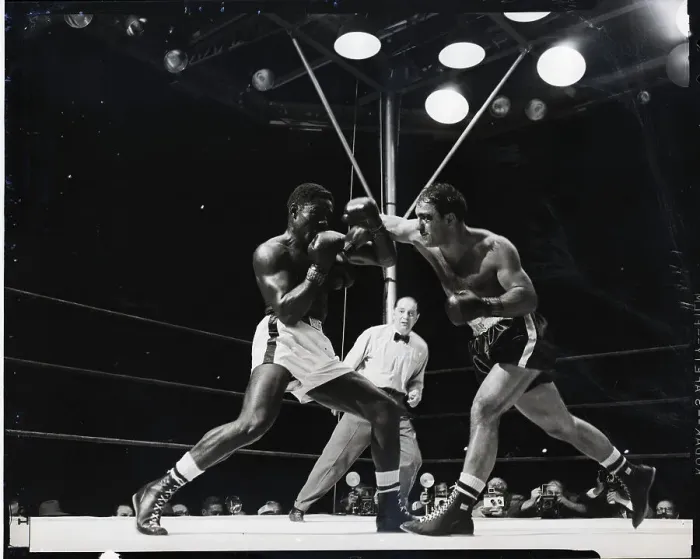 Framed Print : R.Marciano Punches Ezzard Charles Face Framed Print : R.Marciano Punches Ezzard Charles Face