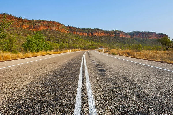 Road, red cliffs, Northern Territory, Australia