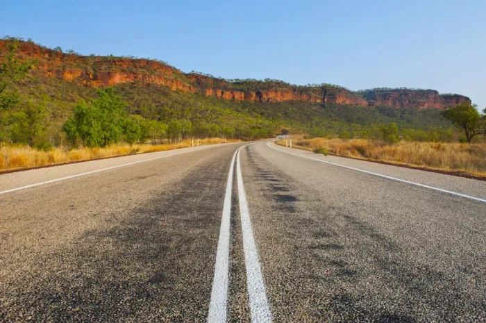 Framed Print : Road, red cliffs, Northern Territory, Australia Framed Print : Road, red cliffs, Northern Territory, Australia