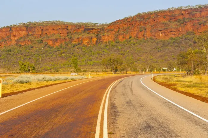Framed Print : Road, red cliffs, Northern Territory, Australia Framed Print : Road, red cliffs, Northern Territory, Australia