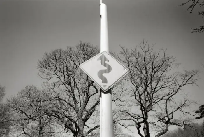 Framed Print : Road sign indicating curves Framed Print : Road sign indicating curves