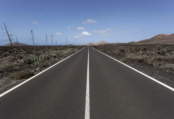 Framed Print : Road through volcanic landscape, near Mancha Blanca, Lanzarote, Canary Islands, Spain