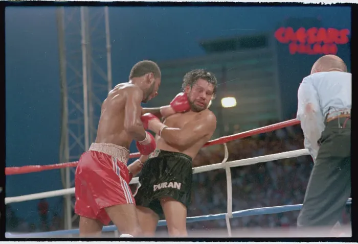 Framed Print : Robbie Sims Punching Roberto Duran