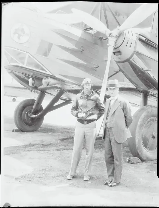 Framed Print : Robert A. Millikan and Squadron Commander by Airplane