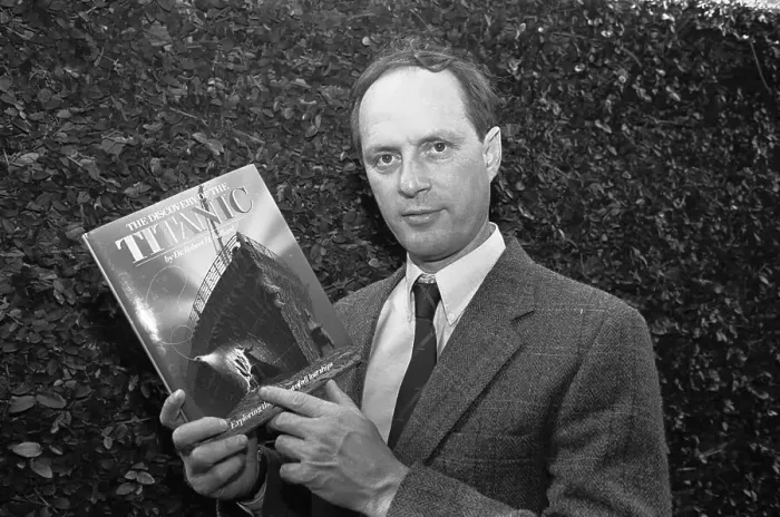 Framed Print : Robert Ballard Holding a Book Framed Print : Robert Ballard Holding a Book