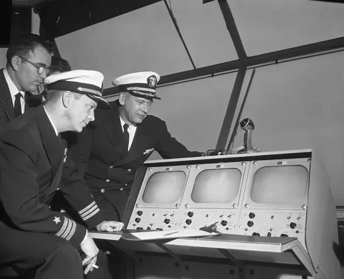 Framed Print : Robert Corlett and Colleagues Viewing Television Screens
