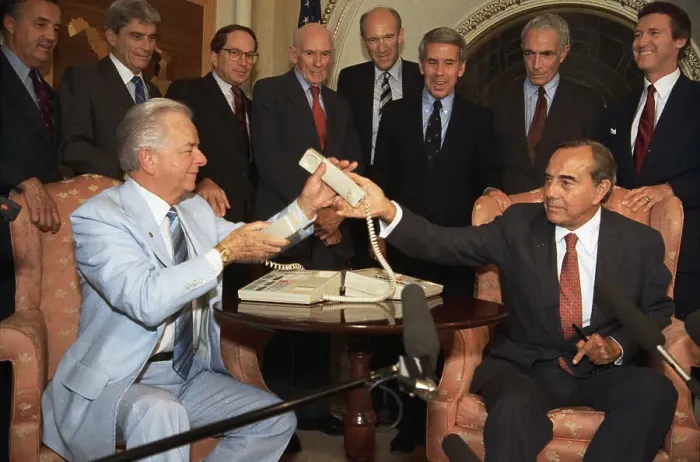 Framed Print : Robert Dole and Robert Byrd Using Telephone