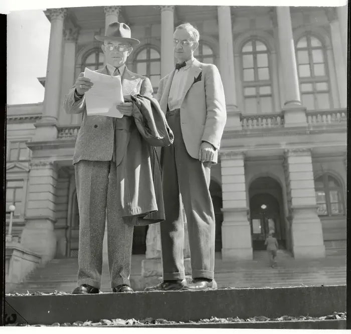 Framed Print : Robert E. Burns Holding Papers Framed Print : Robert E. Burns Holding Papers