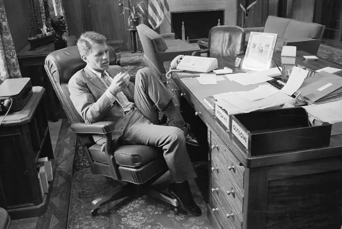 Framed Print : Robert F. Kennedy Sitting With His Leg Propped at His Desk Framed Print : Robert F. Kennedy Sitting With His Leg Propped at His Desk