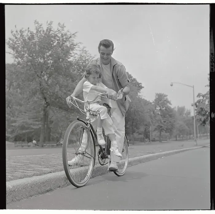 Framed Print : Robert Goulet Riding Bicycle with Daughter Nicki Framed Print : Robert Goulet Riding Bicycle with Daughter Nicki
