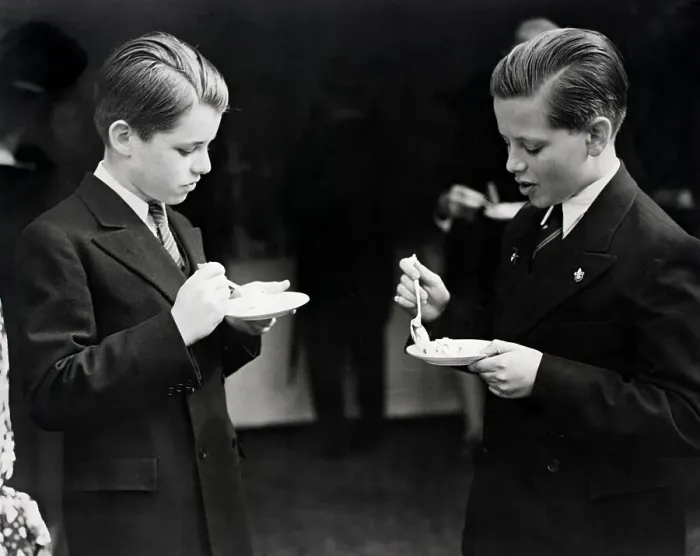 Framed Print : Robert Kennedy and friend eating from a bowl